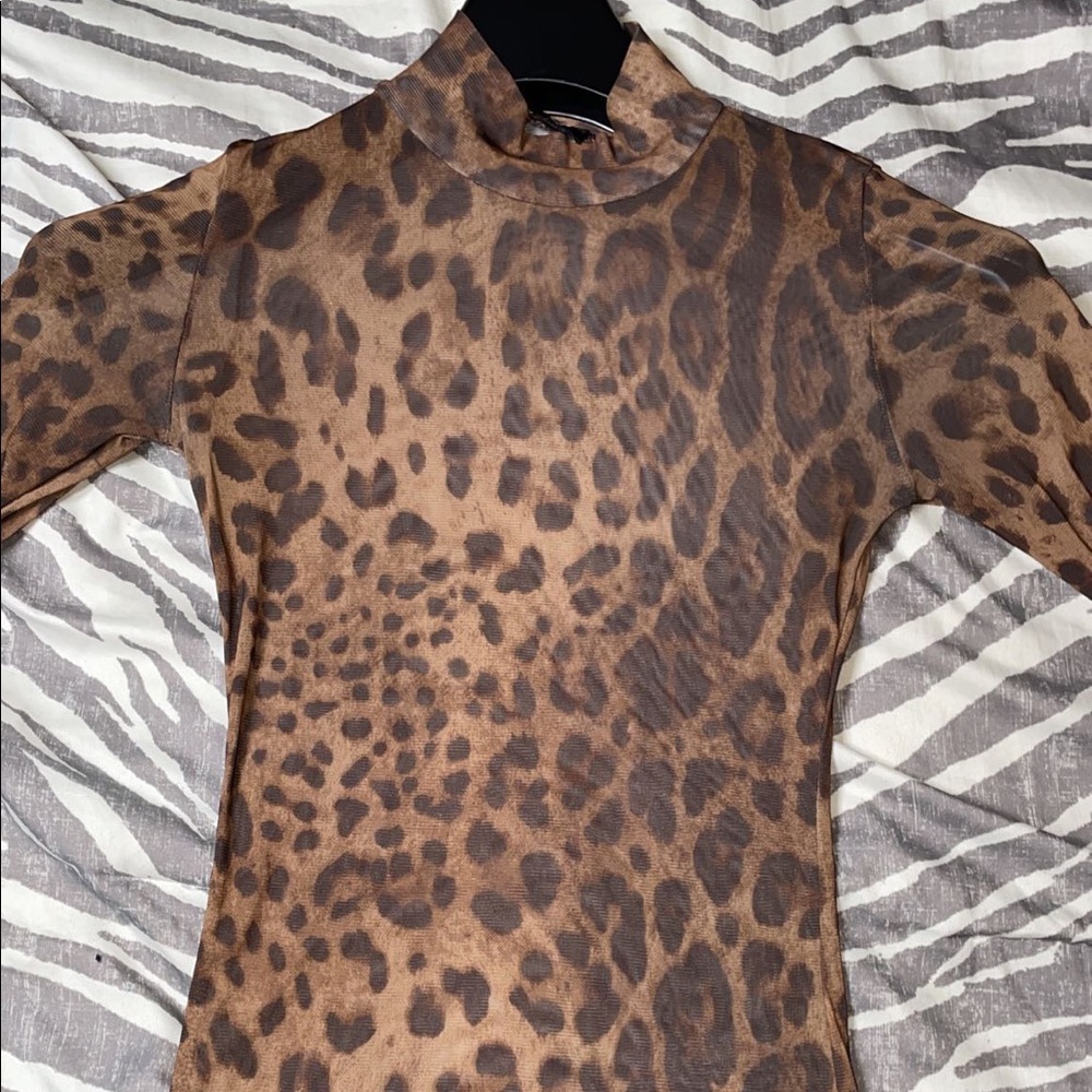 Blouse, stretch material, leopard print, size small, worn once.